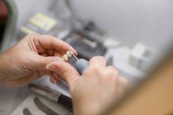 Quels sont les signes d'une bonne hygiène dentaire chez un chien de race Norfolk Terrier ?